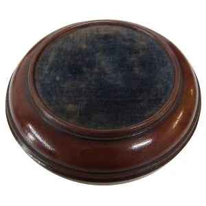 A large early 19th century mahogany wine coaster with brass